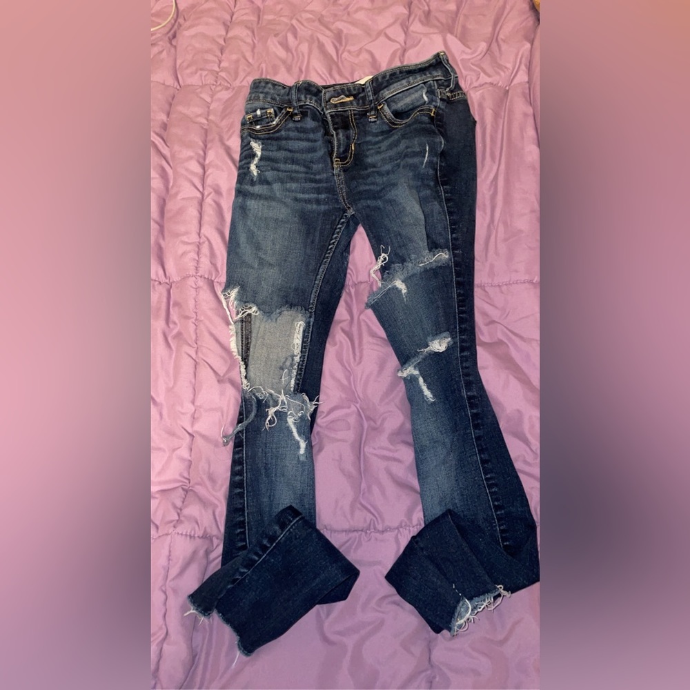 dark ripped lowrise jeans